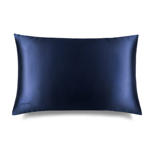 The Midnight Blue Silk Pillowcase features a sleek blue rectangular design with a subtle embroidered DROWSY logo in the lower left corner, displayed on a white background with a soft right shadow—an essential for hair protection and skincare.