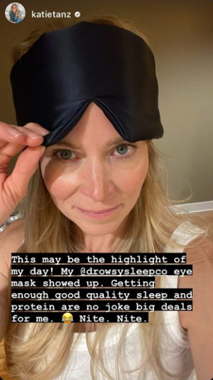 A woman wearing a black eye mask on her forehead smiles at the camera. On the image, text describes her excitement about receiving the eye mask and emphasizes the importance of good sleep and protein.