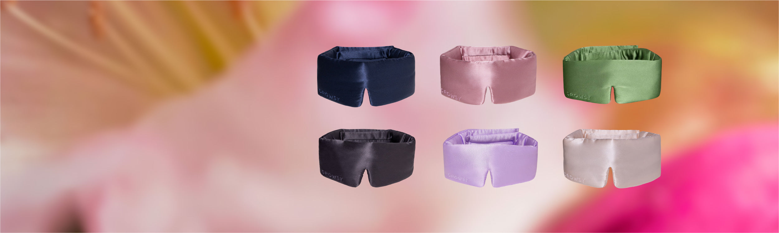 Six satin fabric collars in navy, mauve, green, black, lavender, and silver are displayed against a blurred floral pink and yellow background.