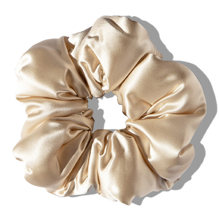 Drowsy Dusty Gold Pillow Scrunchie on a white background