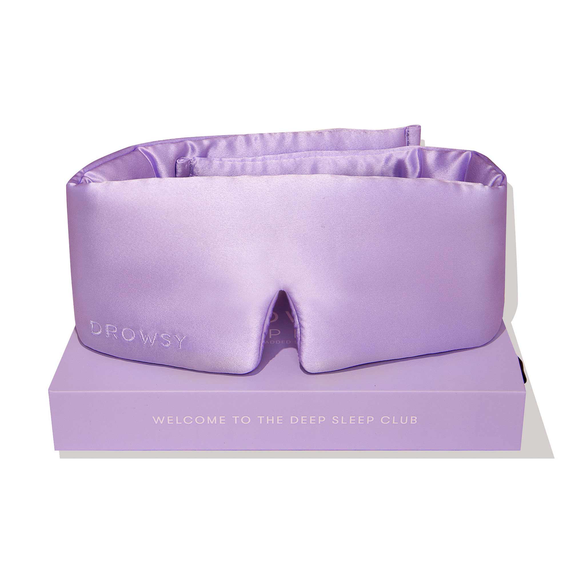 Lavender coloured Drowsy silk sleep mask on white background