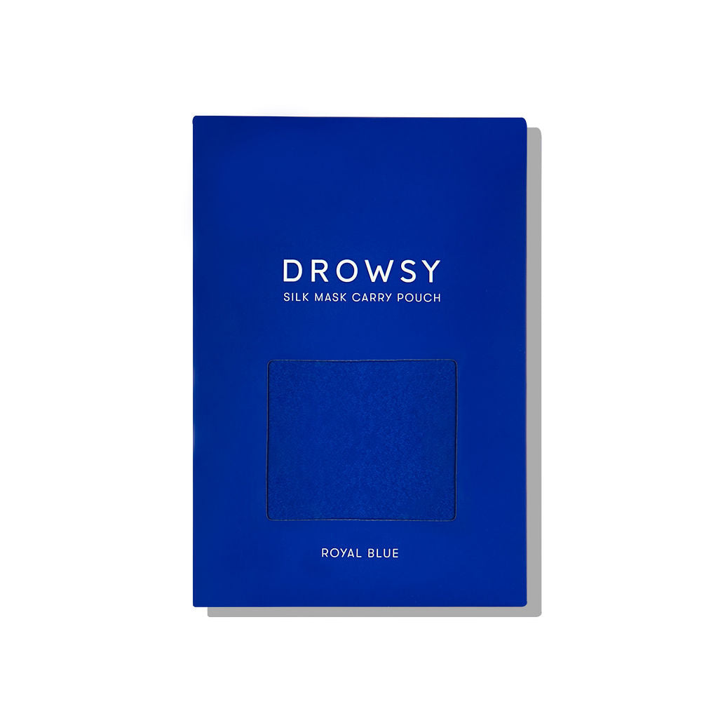 A royal blue rectangular package labeled Royal Blue Silk Carry Pouch features a square cutout revealing the mulberry silk pouch inside, ROYAL BLUE text at the bottom, and a convenient drawstring closure.
