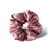 The Damask Rose - Padded Scrunchie is a shiny, pink oversized silk hair accessory with gathered, ruched fabric arranged in a circular shape, shown on a white background for a touch of luxury.