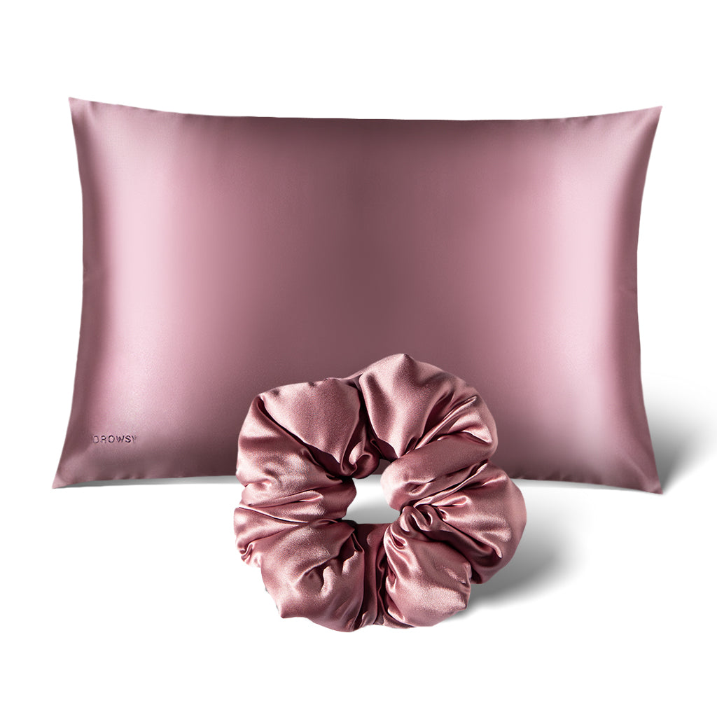 The Perfect Hair Bundle Pink Damask Rose by drowsysleepco features a pink silk pillowcase and matching scrunchie—ideal for reducing bed hair and adding a touch of luxury to your routine.