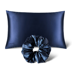 The drowsysleepco Perfect Hair Bundle Midnight Blue features a silk pillowcase and matching padded scrunchie, beautifully displayed on a plain white background.