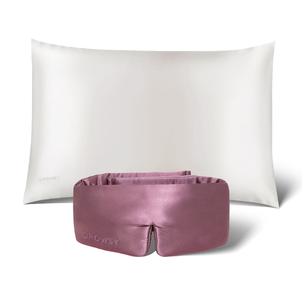 The drowsysleepco Perfect Skin Bundle Pink Damask Rose, featuring a luxurious silk pillowcase and sleep mask, is elegantly displayed on a white background—ideal for restful nights and glowing skin.