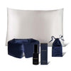 The drowsysleepco Midnight Ritual Bundle in Midnight Blue and Akoya Pearl includes a silk sleep mask, silk pillowcase, small spray bottle, drawstring pouch, and rectangular box arranged on a white background.