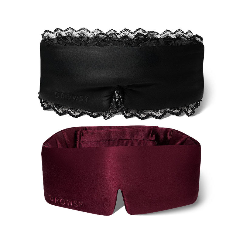The drowsysleepco 2-Pack Sleep Masks set, Paris Love Story + Rouge, features one black mask with lace trim and one deep burgundy mask without lace, both embossed with "DROWSY" on the lower left side.
