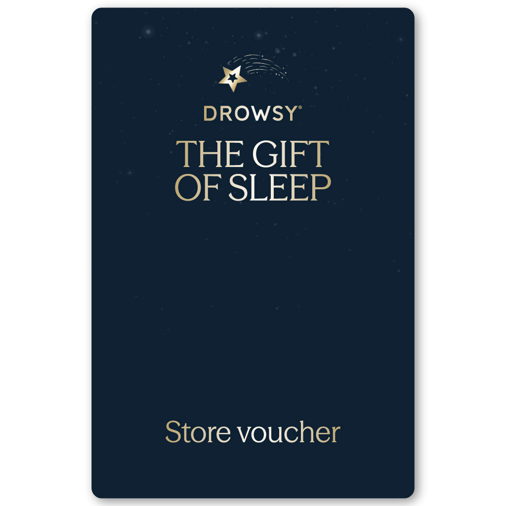 A navy blue Sleep Gift Card featuring gold "Drowsy The Gift of Sleep" text and a store voucher under a star and crescent moon logo—perfect for gifting restful nights from our online store.