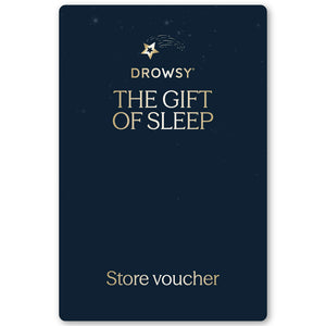 A navy blue Sleep Gift Card featuring gold "Drowsy The Gift of Sleep" text and a store voucher under a star and crescent moon logo—perfect for gifting restful nights from our online store.
