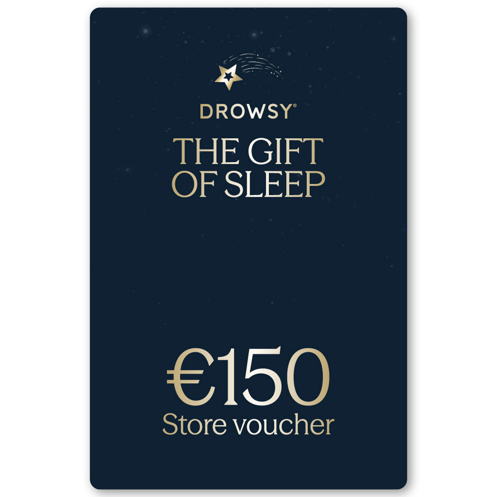 A dark blue Sleep Gift Card with gold “Drowsy, The Gift of Sleep” text and a gold star-crescent logo. Worth €150—perfect for gifting restful nights from our online store.