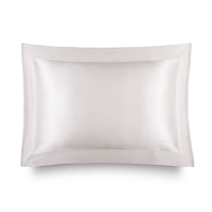 The Hyalo Pillowcase - Akoya Pearl by us.drowsysleepco features a smooth, lustrous white silk finish and a wide stitched border, shown against a plain white background. It offers overnight hydration to help keep your skin looking fresh and radiant.